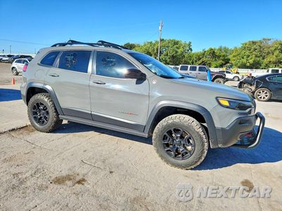 Czwarte zdjęcie samochodu z boku: 2022 JEEP CHEROKEE TRAILHAWK VIN:1C4PJMBX5ND544491 - miniatura
