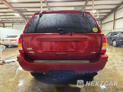 Zdjęcie 6 z 13 samochodu: 2003 JEEP GRAND CHEROKEE OVERLAND VIN:1J8GW68J53C573131 - miniatura