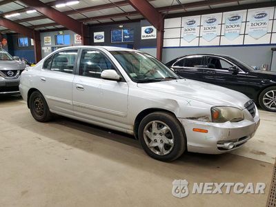 Czwarte zdjęcie samochodu z boku: 2004 HYUNDAI ELANTRA GLS VIN:KMHDN46DX4U755901 - miniatura