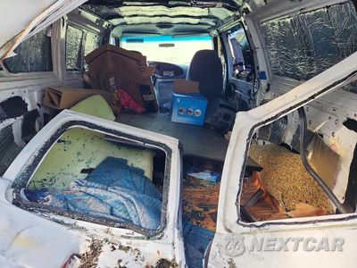 Zdjęcie 10 z 13 samochodu: 2000 FORD ECONOLINE E350 SUPER DUTY VAN VIN:1FTSS34S7YHA09193 - miniatura