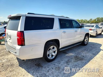 Trzecie zdjęcie samochodu z tyłu: 2015 CHEVROLET SUBURBAN K1500 LTZ VIN:1GNSKKKC4FR131787 - miniatura