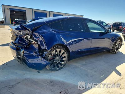 Trzecie zdjęcie samochodu z tyłu: 2023 TESLA MODEL 3 VIN:5YJ3E1EC1PF406811 - miniatura