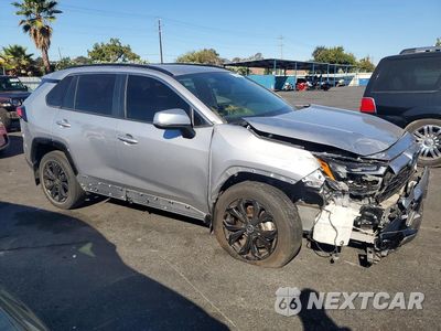 Czwarte zdjęcie samochodu z boku: 2022 TOYOTA RAV4 SE VIN:JTM16RFV9ND059185 - miniatura