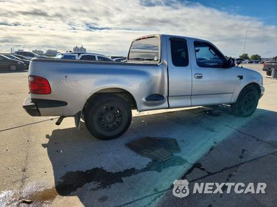 Trzecie zdjęcie samochodu z tyłu: 2002 FORD F150 VIN:2FTRX07L02CA81080 - miniatura