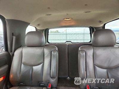 Zdjęcie 10 z 14 samochodu: 2003 GMC YUKON DENALI VIN:1GKEK63U23J285708 - miniatura