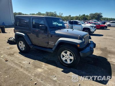 Czwarte zdjęcie samochodu z boku: 2017 JEEP WRANGLER SPORT VIN:1C4AJWAG6HL711406 - miniatura
