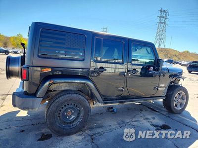 Trzecie zdjęcie samochodu z tyłu: 2014 JEEP WRANGLER UNLIMITED SAHARA VIN:1C4BJWEG4EL247719 - miniatura