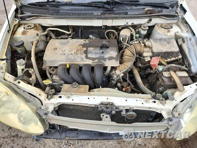 Zdjęcie 11 z 12 samochodu: 2003 TOYOTA COROLLA LE VIN:1NXBR38E03Z022606 - miniatura