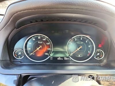 Zdjęcie 9 z 12 samochodu: 2014 BMW 740 LI VIN:WBAYE4C55ED138021 - miniatura