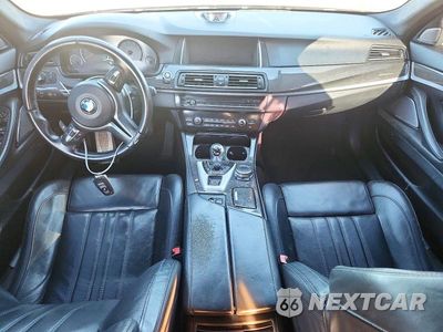 Zdjęcie 8 z 12 samochodu: 2016 BMW M5 VIN:WBSFV9C52GG343362 - miniatura