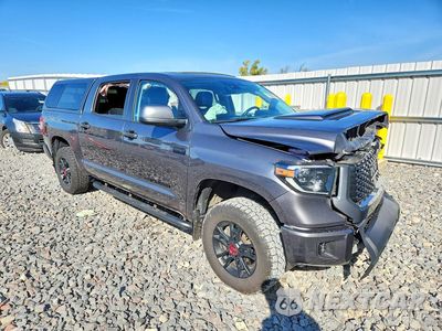 Czwarte zdjęcie samochodu z boku: 2021 TOYOTA TUNDRA TRD PRO VIN:5TFDY5F11MX046036 - miniatura