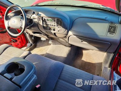 Zdjęcie 8 z 12 samochodu: 2003 FORD F150 VIN:1FTRX07243KC92609 - miniatura