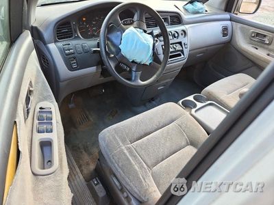 Zdjęcie 8 z 13 samochodu: 2002 HONDA ODYSSEY EX VIN:2HKRL186X2H529779 - miniatura