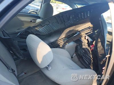Zdjęcie 12 z 13 samochodu: 2010 TOYOTA COROLLA LE VIN:1NXBU4EE6AZ264712 - miniatura