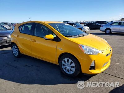 Czwarte zdjęcie samochodu z boku: 2014 TOYOTA PRIUS C TWO VIN:JTDKDTB32E1078660 - miniatura
