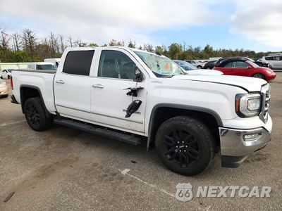Czwarte zdjęcie samochodu z boku: 2017 GMC SIERRA K1500 SLT VIN:3GTU2NEC9HG394097 - miniatura