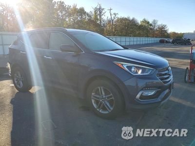 Czwarte zdjęcie samochodu z boku: 2017 HYUNDAI SANTA FE SPORT 2.4L VIN:5NMZUDLBXHH027136 - miniatura