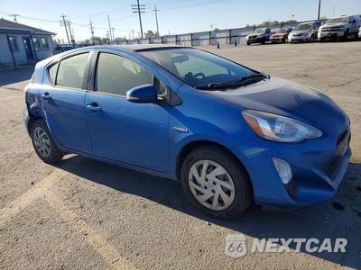 Czwarte zdjęcie samochodu z boku: 2015 TOYOTA PRIUS C TWO VIN:JTDKDTB33F1098255 - miniatura