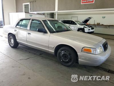 Czwarte zdjęcie samochodu z boku: 2003 FORD CROWN VICTORIA VIN:2FAFP73W23X212733 - miniatura