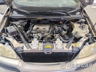 Zdjęcie 12 z 13 samochodu: 2000 CHEVROLET VENTURE VIN:1GNDU03E7YD130673 - miniatura