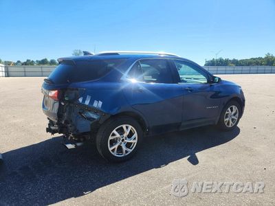 Trzecie zdjęcie samochodu z tyłu: 2020 CHEVROLET EQUINOX LT VIN:2GNAXVEX2L6118427 - miniatura