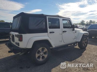 Trzecie zdjęcie samochodu z tyłu: 2016 JEEP WRANGLER UNLIMITED SAHARA VIN:1C4BJWEG6GL199367 - miniatura