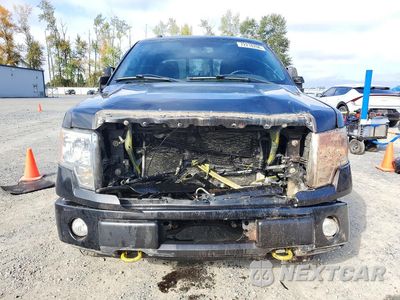 Piąte zdjęcie samochodu w środku: 2011 FORD F150 SUPERCREW VIN:1FTFW1E63BFA51777 - miniatura