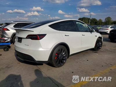 Trzecie zdjęcie samochodu z tyłu: 2022 TESLA MODEL Y VIN:7SAYGDEF1NF329515 - miniatura