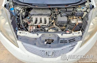 Zdjęcie 11 z 12 samochodu: 2010 HONDA FIT VIN:JHMGE8H26AC037587 - miniatura