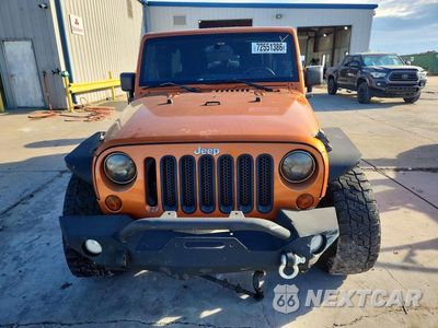 Piąte zdjęcie samochodu w środku: 2011 JEEP WRANGLER UNLIMITED SAHARA VIN:1J4BA5H13BL604184 - miniatura