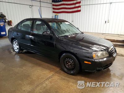 Czwarte zdjęcie samochodu z boku: 2004 HYUNDAI ELANTRA GLS VIN:KMHDN46D14U719191 - miniatura