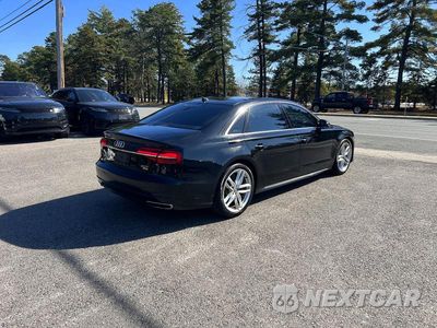 Czwarte zdjęcie samochodu z boku: 2017 AUDI A8 L QUATTRO VIN:WAU43AFDXHN014203 - miniatura