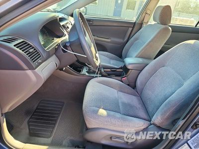 Zdjęcie 7 z 12 samochodu: 2003 TOYOTA CAMRY LE VIN:4T1BE32K13U708812 - miniatura