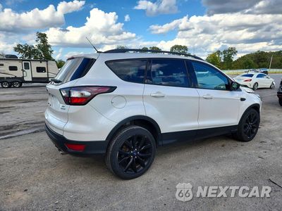 Trzecie zdjęcie samochodu z tyłu: 2018 FORD ESCAPE SE VIN:1FMCU0GD1JUA79050 - miniatura