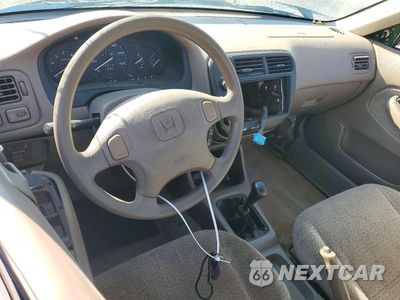 Zdjęcie 8 z 12 samochodu: 1999 HONDA CIVIC LX VIN:1HGEJ6574XL015316 - miniatura