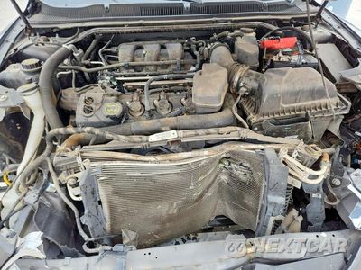 Zdjęcie 11 z 13 samochodu: 2015 FORD TAURUS SEL VIN:1FAHP2E82FG164543 - miniatura