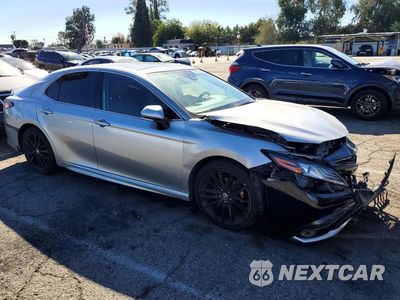Czwarte zdjęcie samochodu z boku: 2021 TOYOTA CAMRY XSE VIN:4T1K61AK7MU474115 - miniatura