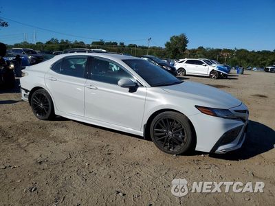 Czwarte zdjęcie samochodu z boku: 2023 TOYOTA CAMRY XSE VIN:4T1K61BK4PU092353 - miniatura