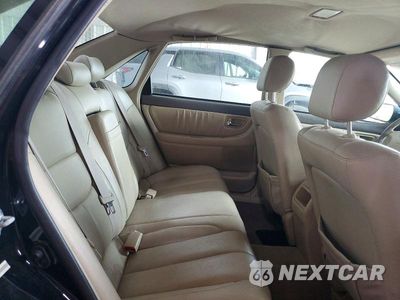 Zdjęcie 10 z 12 samochodu: 2003 TOYOTA AVALON XL VIN:4T1BF28B43U268227 - miniatura