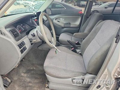 Zdjęcie 7 z 13 samochodu: 2003 CHEVROLET TRACKER VIN:2CNBE13CX36953148 - miniatura