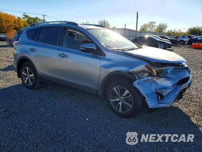 Czwarte zdjęcie samochodu z boku: 2018 TOYOTA RAV4 XLE VIN:JTMRFREV7JJ243976 - miniatura