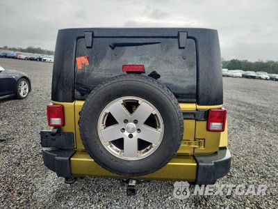 Zdjęcie 6 z 12 samochodu: 2010 JEEP WRANGLER UNLIMITED SAHARA VIN:1J4BA5H11AL220256 - miniatura