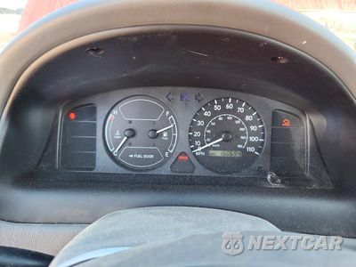 Zdjęcie 9 z 12 samochodu: 2000 TOYOTA COROLLA VIN:1NXBR12E3YZ367908 - miniatura