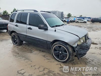 Czwarte zdjęcie samochodu z boku: 2003 CHEVROLET TRACKER VIN:2CNBE13CX36953148 - miniatura
