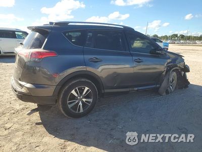 Trzecie zdjęcie samochodu z tyłu: 2018 TOYOTA RAV4 XLE VIN:JTMWFREV5JD132392 - miniatura