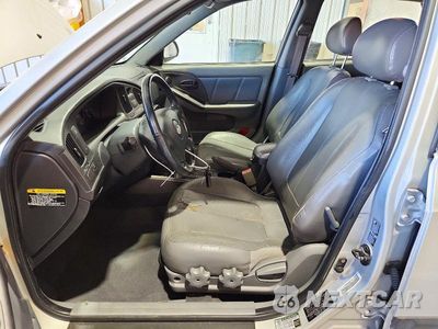 Zdjęcie 7 z 12 samochodu: 2004 HYUNDAI ELANTRA GT VIN:KMHDN56D74U126988 - miniatura