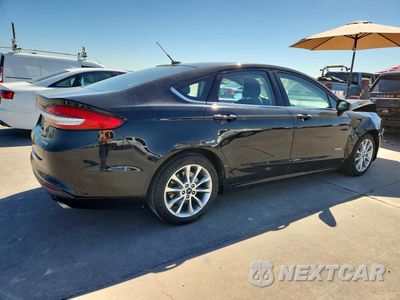 Trzecie zdjęcie samochodu z tyłu: 2017 FORD FUSION SE HYBRID VIN:3FA6P0LU3HR408871 - miniatura