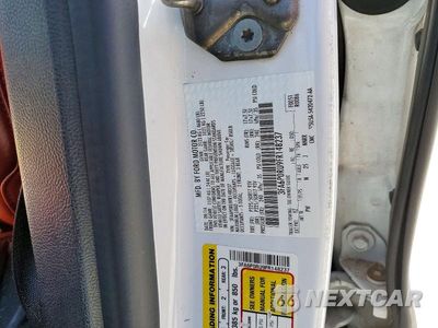 Zdjęcie 12 z 12 samochodu: 2015 FORD FUSION TITANIUM HEV VIN:3FA6P0RU9FR148237 - miniatura