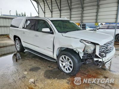 Czwarte zdjęcie samochodu z boku: 2020 GMC YUKON XL DENALI VIN:1GKS2HKJ0LR266940 - miniatura