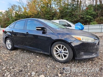 Czwarte zdjęcie samochodu z boku: 2016 FORD FOCUS SE VIN:1FADP3F20GL395268 - miniatura